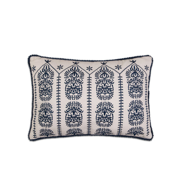 White pillow w/navy embroidery